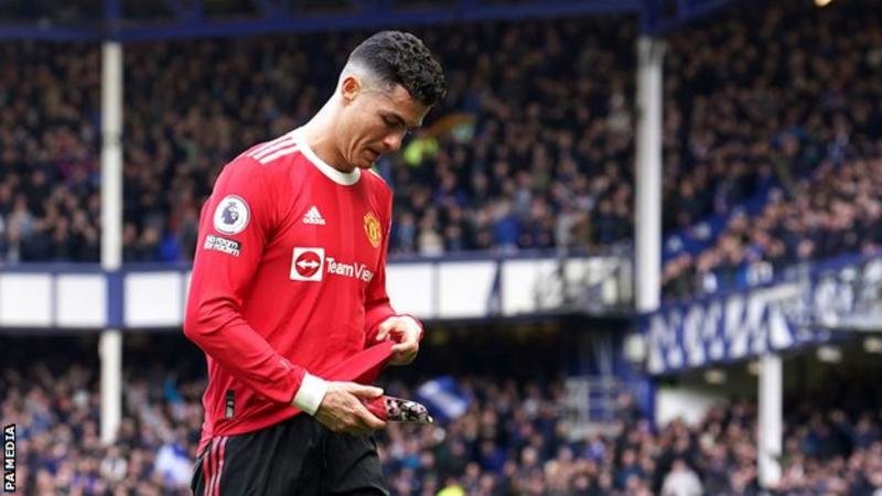 Cristiano Ronaldo appeared to knock a young fan's phone to the ground as he walked down the tunnel at Goodison