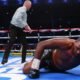 Tyson Fury remains unbeaten in 33 bouts after flooring Dillian Whyte