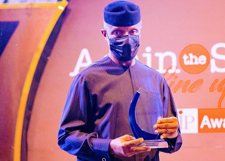 Vice President Yemi Osinbajo being presented with the LEADERSHIP Person of the Year Award 2021