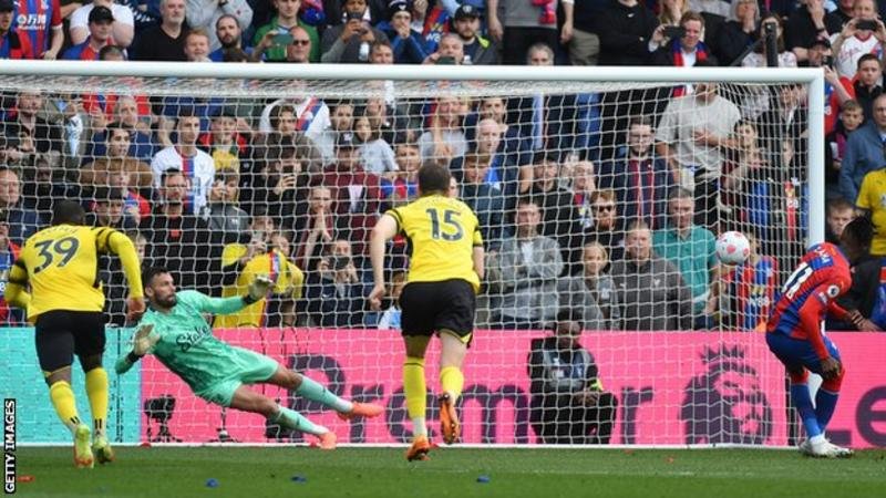 Wilfried Zaha tucked his penalty past Ben Foster after Hassane Kamara's handball Watford