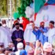 President Muhammadu Buhari hands Asiwaju Bola Tinubu the party's flag as presidential candidate Lawan