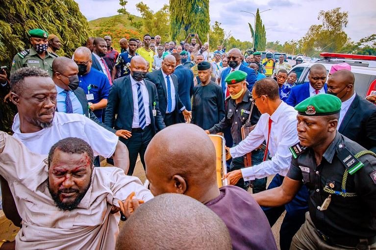 Vice President Yemi Osinbajo oversees the evacuation of the car accident victim