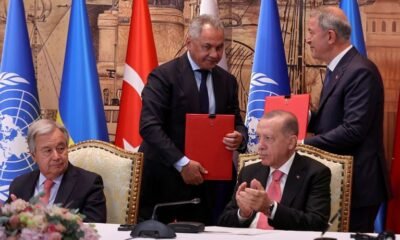 UN Secretary-General Antonio Guterres, Russia's Defence Minister Sergei Shoigu and Turkish President Recep Tayyip Erdogan attend a signing ceremony in Istanbul, Turkey