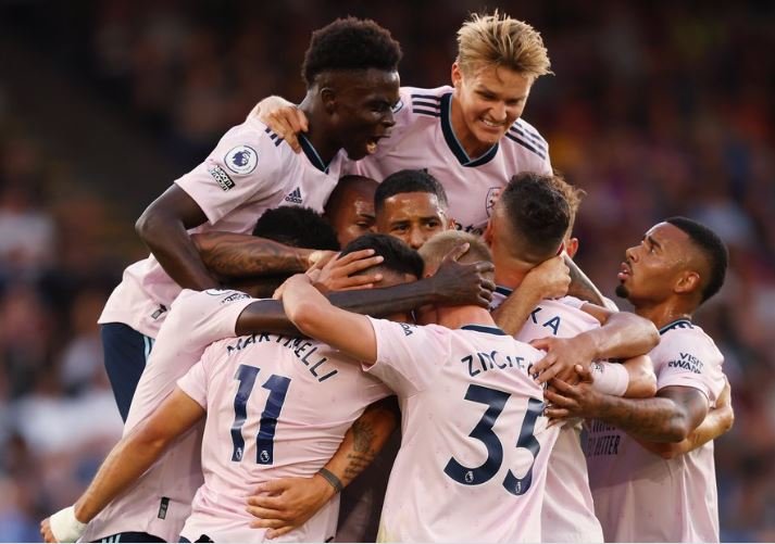 Arsenal players celebrate Martinelli's goal as the Gunners raced to a first half lead