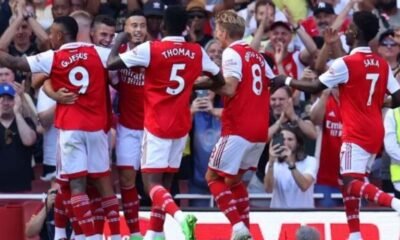 Granit Xhaka mobbed by teammates after he grabbed Arsenal's third goal