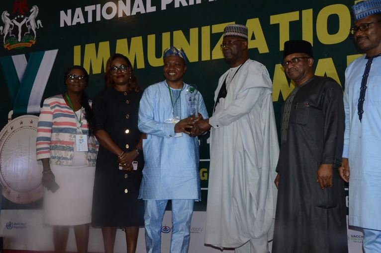 Governor Babajide Sanwo-Olu SGF, Boss Mustapha presents Best performing state award in the South West Routine Immunization to Lagos State