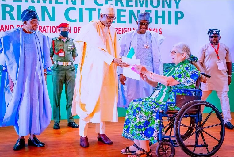 President Muhammadu Buhari confers American citizenship, Mrs. Kathryn Teresa Barrera with Nigerian citizenship