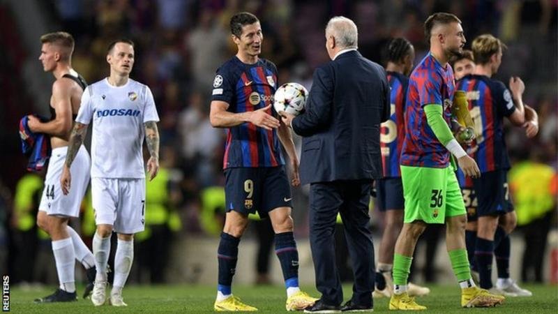 Robert Lewandowski was handed the match ball at the end after his 33-minute hat-trick