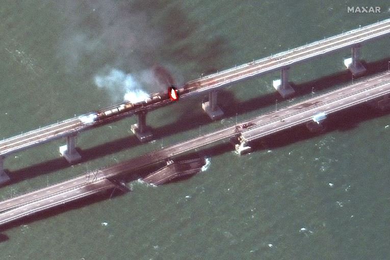 A satellite image shows a close up view of smoke rising from a fire on the Kerch bridge in the Kerch Strait, Crimea