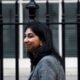 Britain's Secretary of State for the Home Department Suella Braverman walks outside Number 10 Downing Street in London, Britain