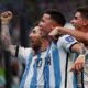 Argentina's goal scorers Enzo Fernandez and Lionel Messi celebrate their second goal