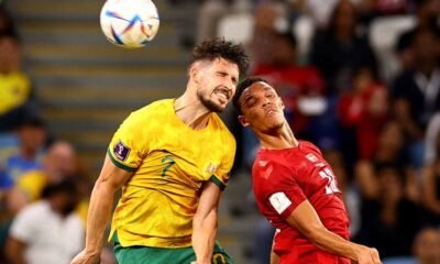 Australia's Mathew Leckie in action with Denmark's Alexander Bah