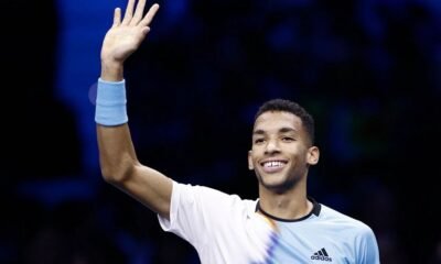 Canada's Felix Auger-Aliassime celebrates winning his group stage match against Spain's Rafael Nadal...