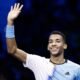 Canada's Felix Auger-Aliassime celebrates winning his group stage match against Spain's Rafael Nadal...