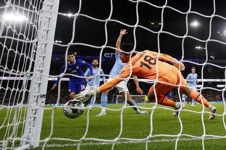 Manchester City's Stefan Ortega saves from Chelsea's Christian Pulisic