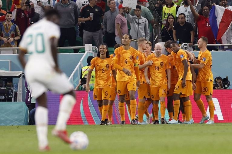Netherlands' Davy Klaassen celebrates scoring their second goal with teammates