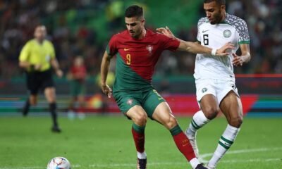 Portugal's Andre Silva in action with Nigeria's Kevin Akpoguma