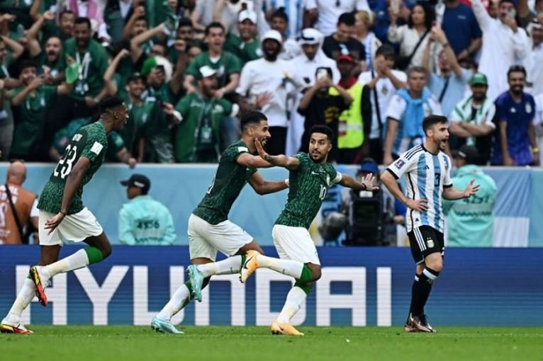 Saudi Arabia's Salem Al-Dawsari celebrates scoring their second goal with teammates