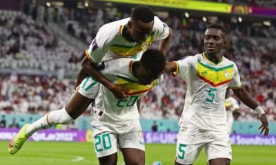 Senegal's Bamba Dieng celebrates scoring their third goal with teammates