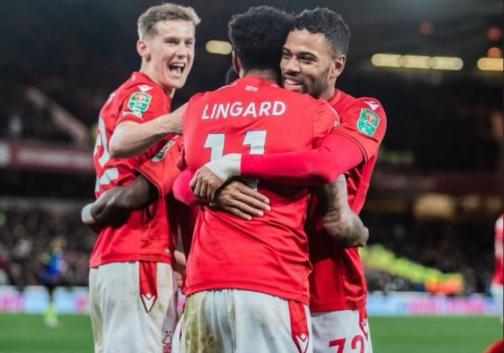 The three goalscorers for Nottingham Forest celebrate Jesse Lingard's goal
