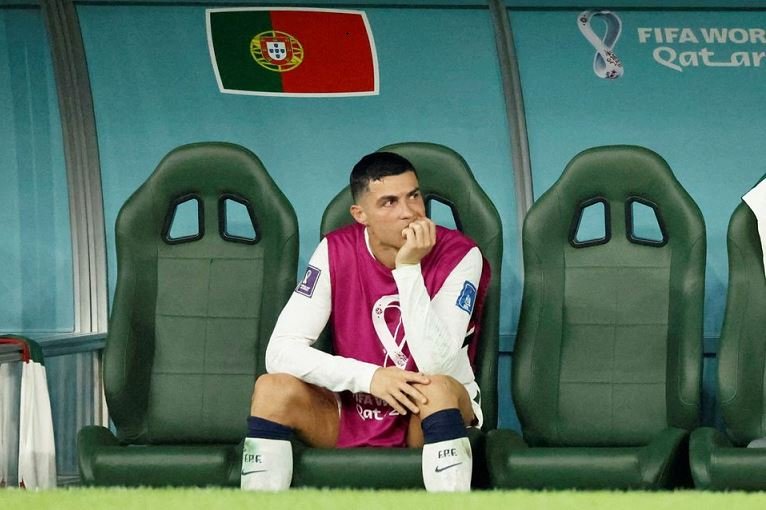 Cristiano Ronaldo on the substitutes bench after he was replaced