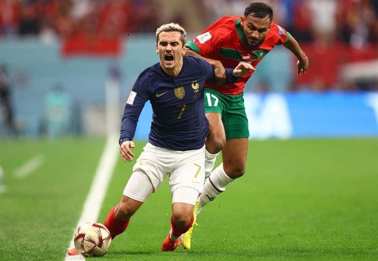 France's Antoine Griezmann in action with Morocco's Sofiane Boufal