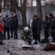 Rescuers and police officers examine parts of the drone at the site of a building destroyed by a Russian drone attack, as their attack on Ukraine continues, in Kyiv, Ukraine December 14, 2022