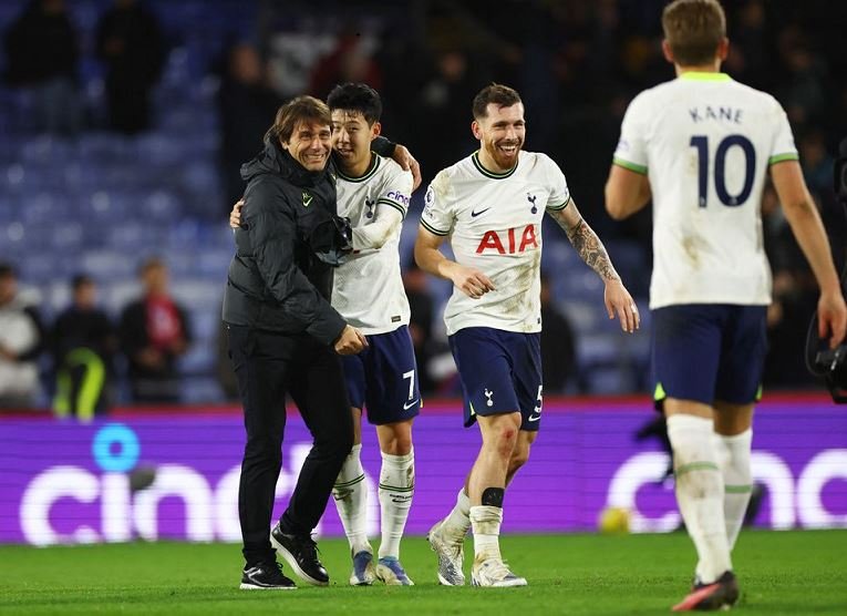 Antonio Conte and Son Heung-min celebrate after the match and Harry Kane