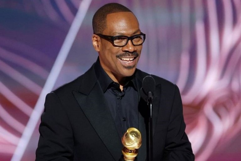 Eddie Murphy poses with the Cecil B. deMille Award