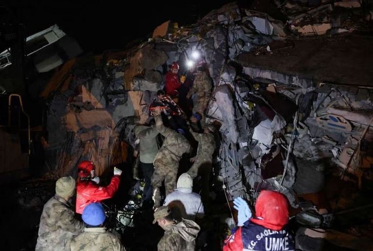 Cennet Sucu is rescued from the rubble of collapsed hospital, following an earthquake in Iskenderun, Turkey February 6, 2023. REUTERS Umit Bektas