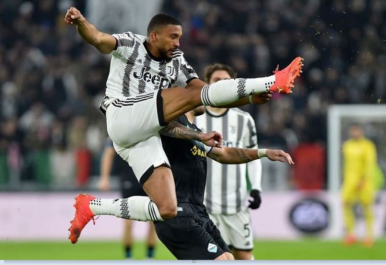 Juventus' Bremer in action with Lazio's Ciro Immobile