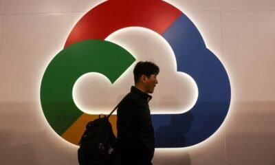 A person walks next to the Google Cloud logo at the Mobile World Congress (MWC) in Barcelona, Spain February 27, 2023. REUTERS/Nacho Doce