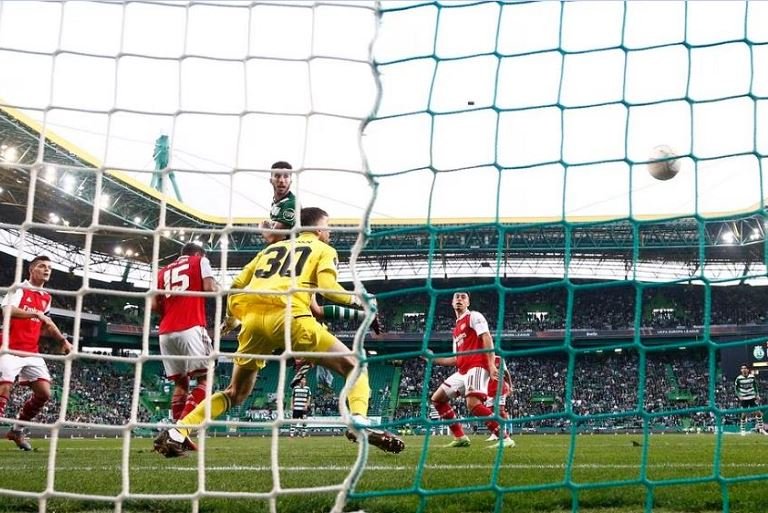 Sporting CP's Goncalo Inacio scores their first goal past Arsenal's Matt Turner