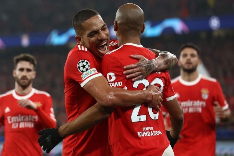 Benfica's Joao Mario celebrates scoring their fourth goal with teammate Gilberto