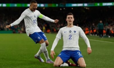 France's Benjamin Pavard celebrates scoring their first goal with Kylian Mbappe