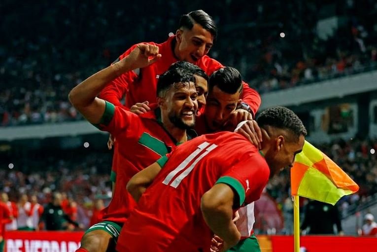 Morocco's Abdelhamid Sabiri celebrates scoring their second goal with teammates