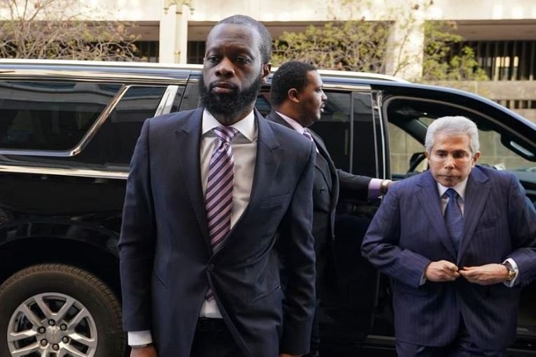Grammy award-winning Fugees rapper Prakazrel (Pras) Michel, who is facing criminal charges in an alleged illegal lobbying campaign, arrives with his lawyer David Kenner for opening arguments in his trial at US District Court in Washington, US, March 30, 2023. REUTERS/Kevin Lamarque