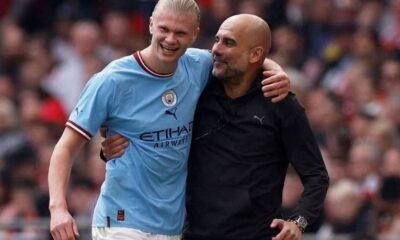 Erling Haaland with manager Pep Guardiola after being substituted Action Images via Reuters/Jason Cairnduff TPX