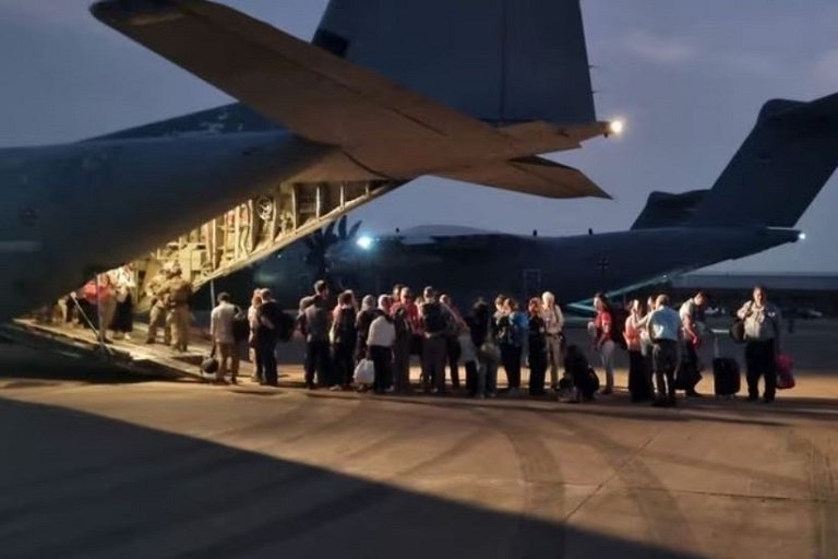 Italian citizens board an Italian Air Force C130 aircraft during their evacuation from Khartoum, Sudan, in this undated photo obtained by Reuters on April 24, 2023.