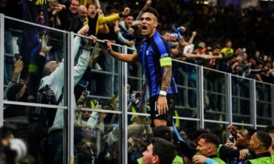 Lautaro Martinez celebrates his goal with Inter Milan fans in the Champions League semi-final second leg