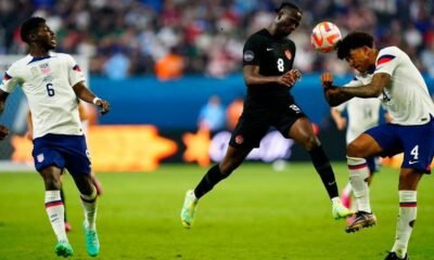 USA defender Chris Richards (4) heads the ball against Canada midfielder Ismael Kone (8) during the second half at Allegiant Stadium. Credit: Lucas Peltier-USA TODAY Sports CONCACAF