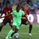 Nigeria's Uchenna Kanu in action with Canada's Quinn/REUTERS