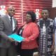 Cheryldene Cook presented with the recovered property certificate by EFCC