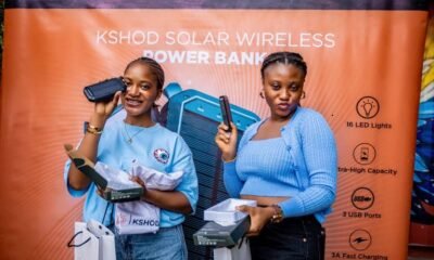 Customers flaunt their KSHOD Wireless Powerbank at the sales fair in Lekki, Lagos State