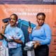 Customers flaunt their KSHOD Wireless Powerbank at the sales fair in Lekki, Lagos State