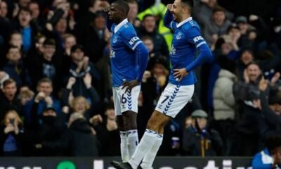 McNeil celebrates with Doucoure after he put Everton ahead against Chelsea at Goodison Park