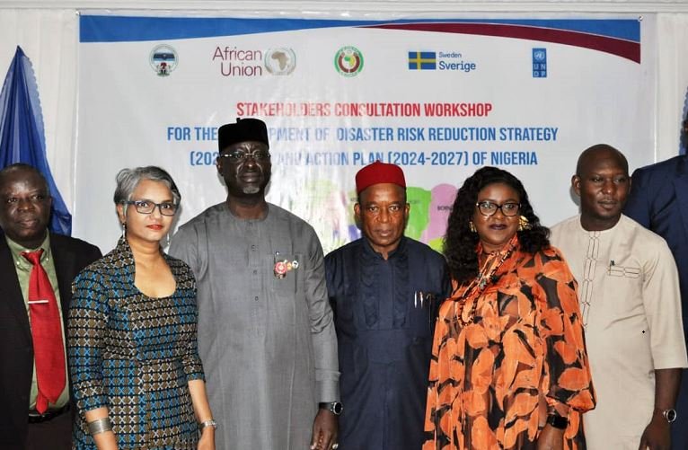 DG NEMA, Mustapha Habib Ahmed (middle) flanked by participants at the Disaster Risk Reduction Strategy workshop in November