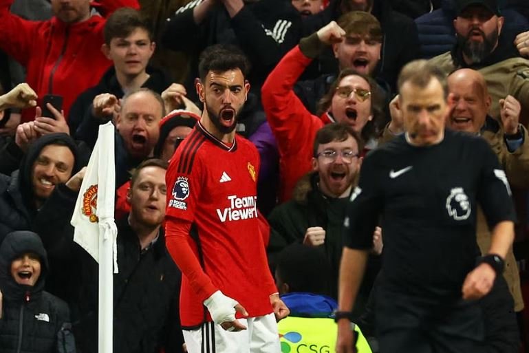 Bruno Fernandes reacts after scoring Manchester United's third goal against Sheffield United at Old Trafford