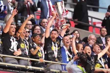 Southampton’s Jack Stephens lifts the trophy after their victory at Wembley