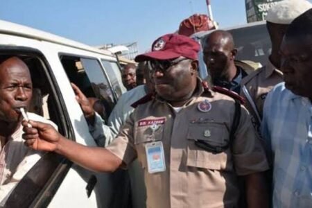 FRSC using breathalyser to test a driver